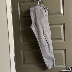 Worn out faded gray color American eagle jogger pants.